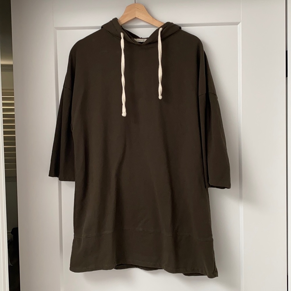 Hooded three-quarter sleeve dress.